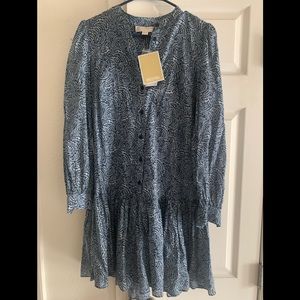 Cute beautiful designer dress that can be dressed up and casual!